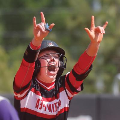 Softball player celebrating